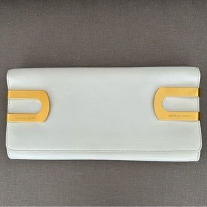 MICHAEL KORS white and gold clutch. Excellent condition. Genuine leather